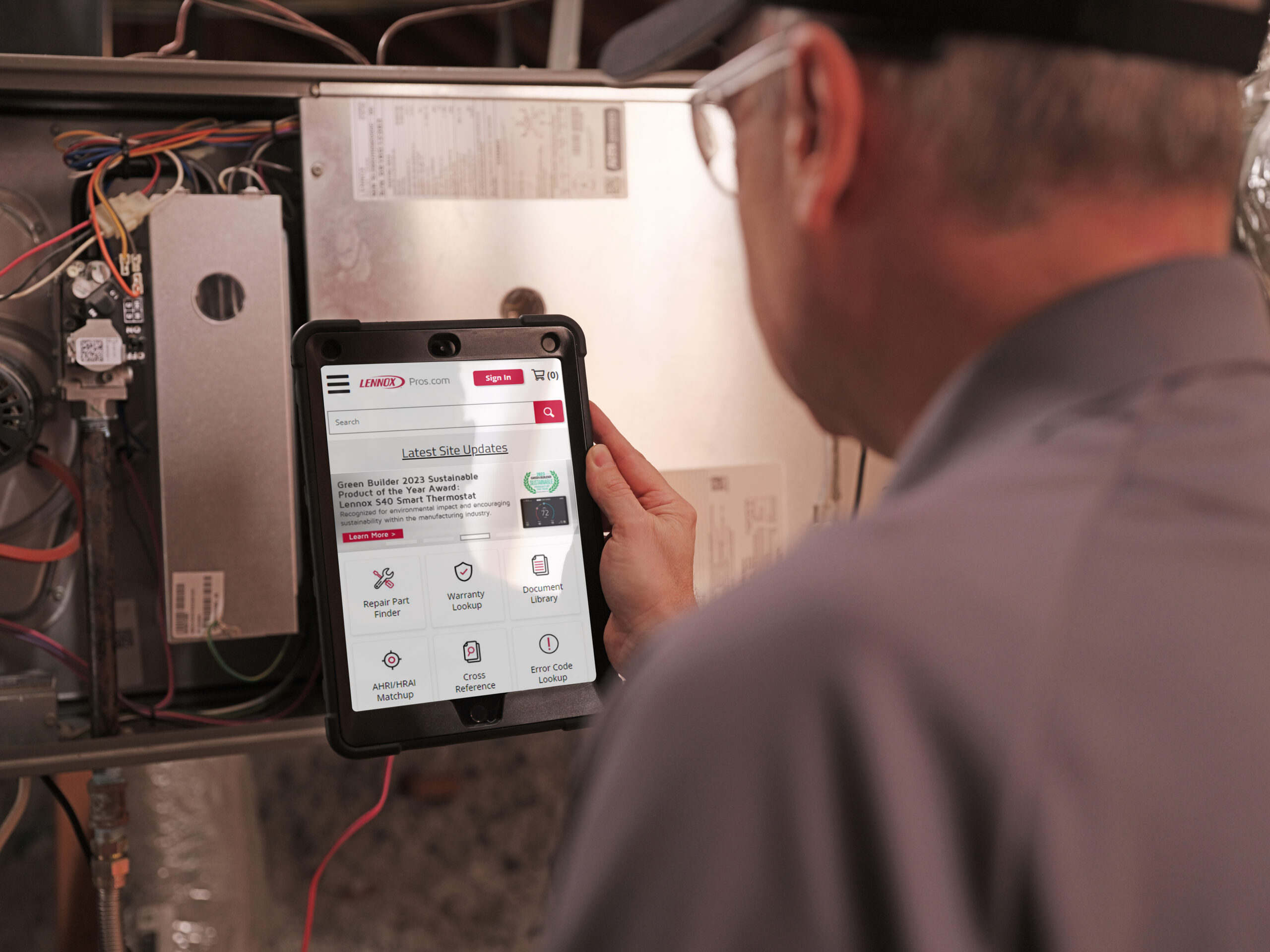 Nuvo HVAC technician installing a furnace in a classic Highland Park, TX luxury home with attention to detail and protection of home finishes