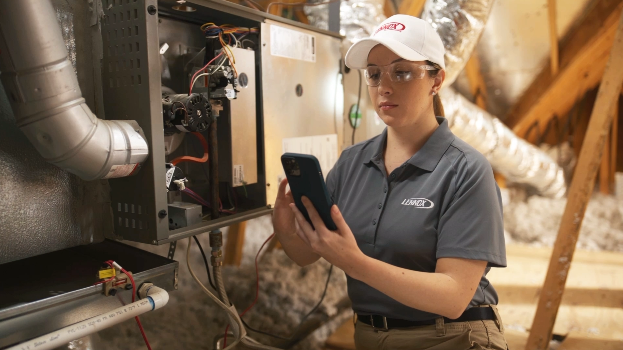 Skilled HVAC technician using diagnostic tools to optimize AC system performance in Highland Park, TX home