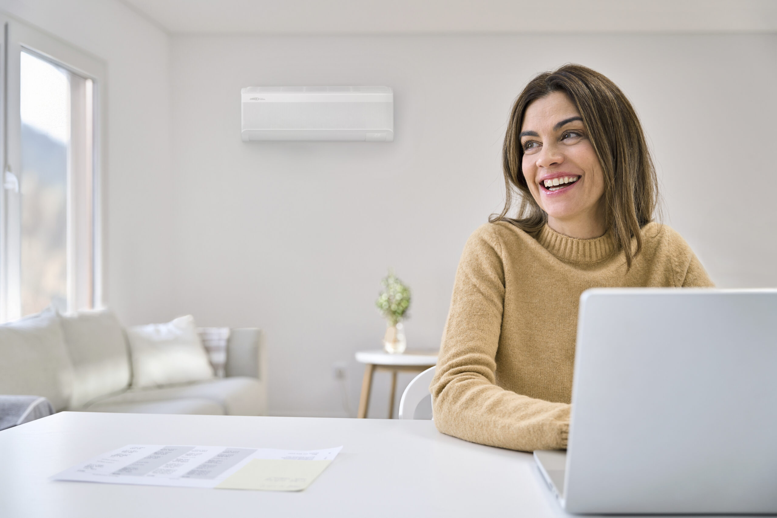 Nuvo HVAC technician installing whole home air purification in Highland Park, TX
