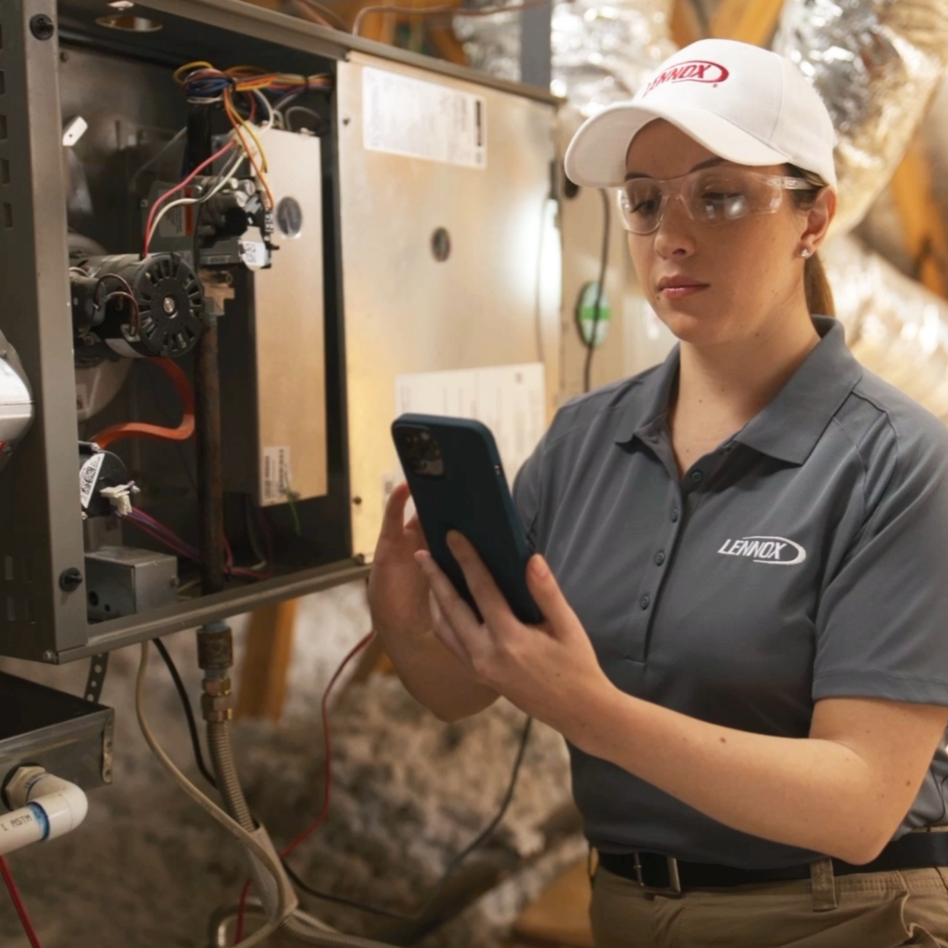 Skilled HVAC technician using diagnostic tools to optimize AC system performance in Highland Park, TX home