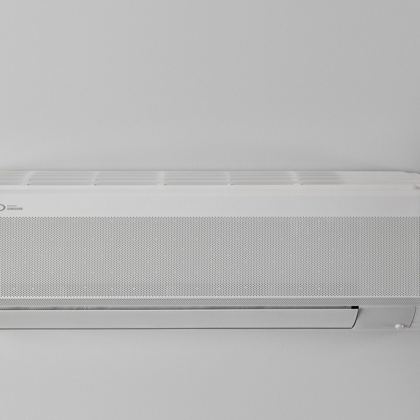 Whole Home Air Purification in Oak Lawn, TX being installed beside a residential indoor air handler