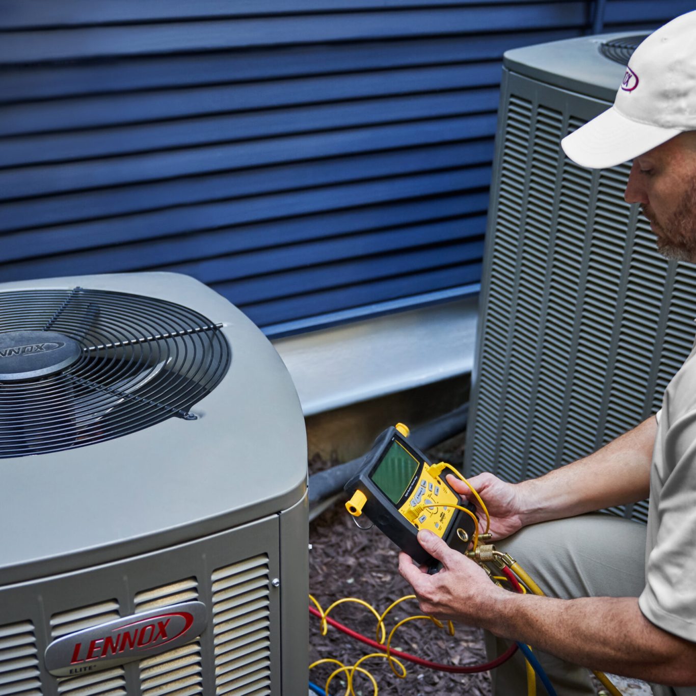 Nuvo HVAC technician installing whole home air purification in Lakewood, TX