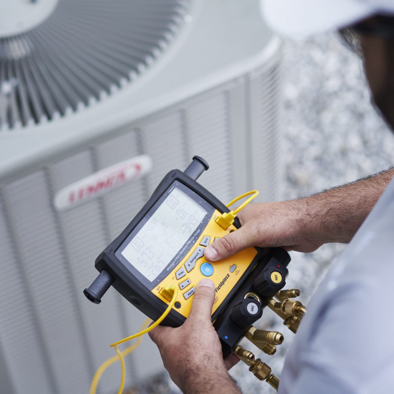Nuvo HVAC technician inspecting HVAC system